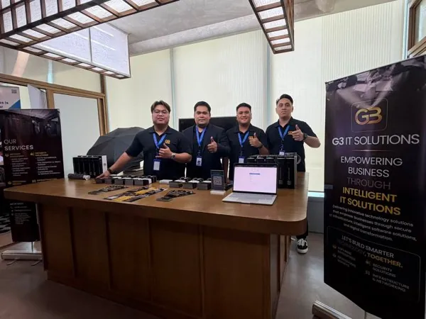 G3 team at a tech expo booth
